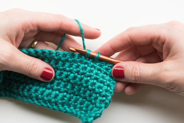 Insert hook into the next stitch, yarn over and draw up a loop. Two loops will now be on your hook.