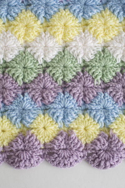 This beautiful throw blanket pattern uses the Bavarian stitch