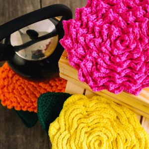 https://www.ilikecrochet.com/wp-content/uploads/Peek-a-Bloom-Floral-Coasters-small-sharpened-1568-300x300.jpg